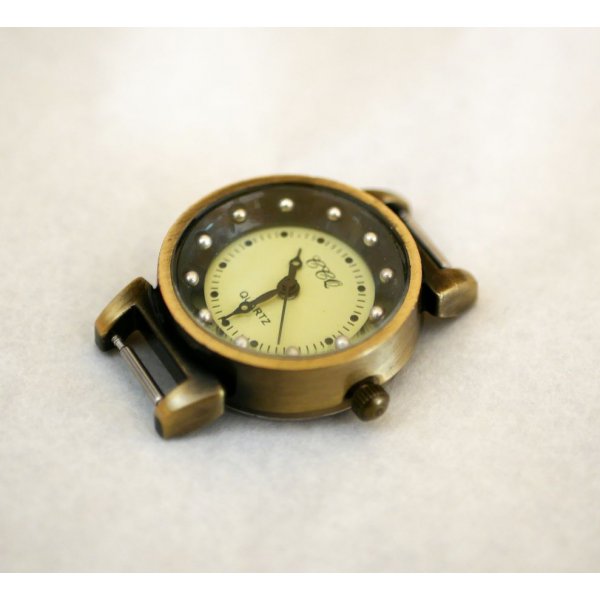 Sort og bronze fjeder urskive