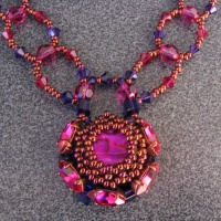 Notice de collier vanuatu fuchsia