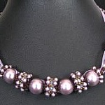 Notice collier au ruban Haranai mauve
